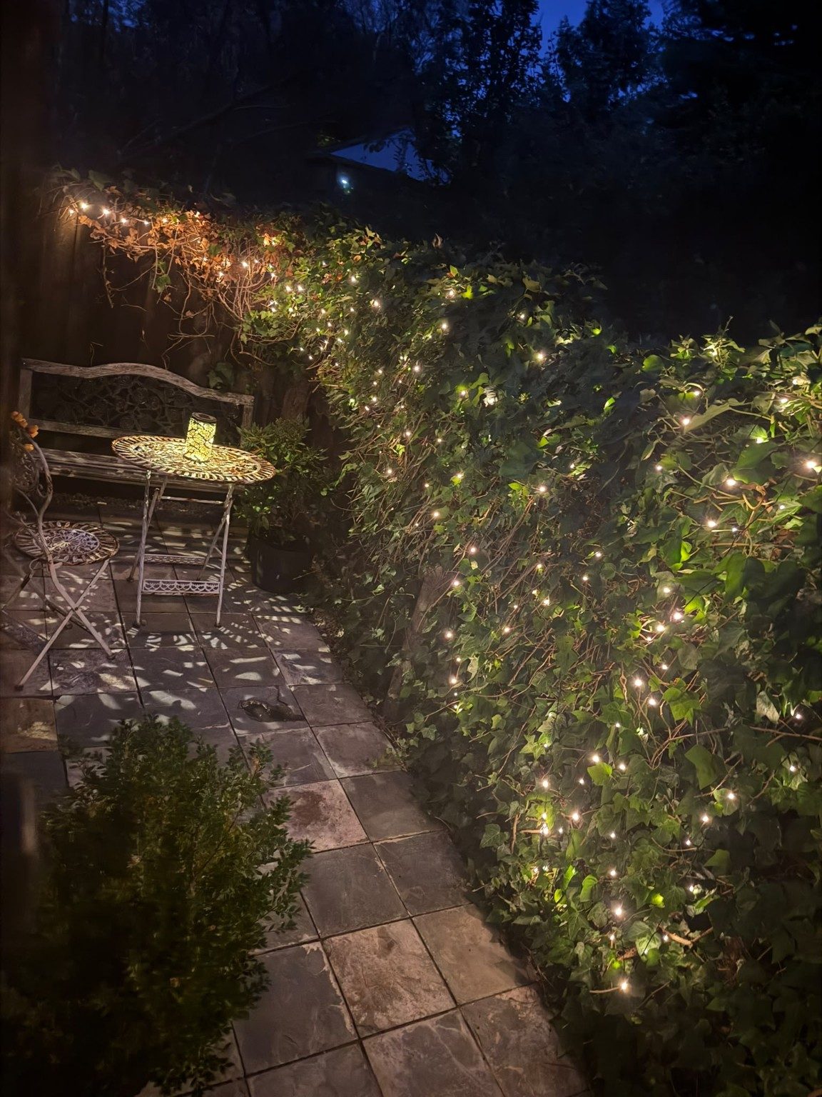 Yaffles Barn private patio with evening lights