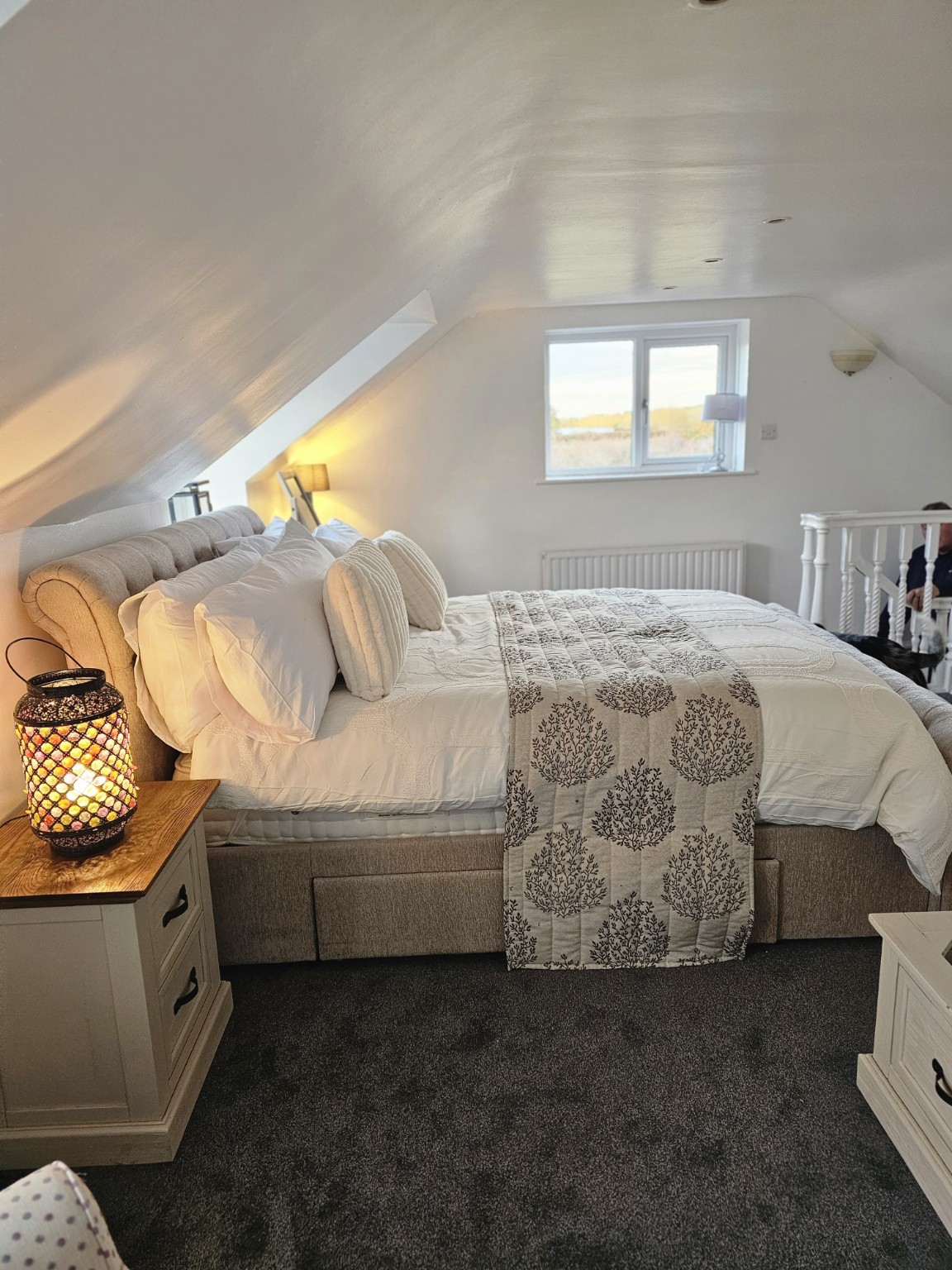 Yaffles Barn king-size bedroom from the side with countryside view